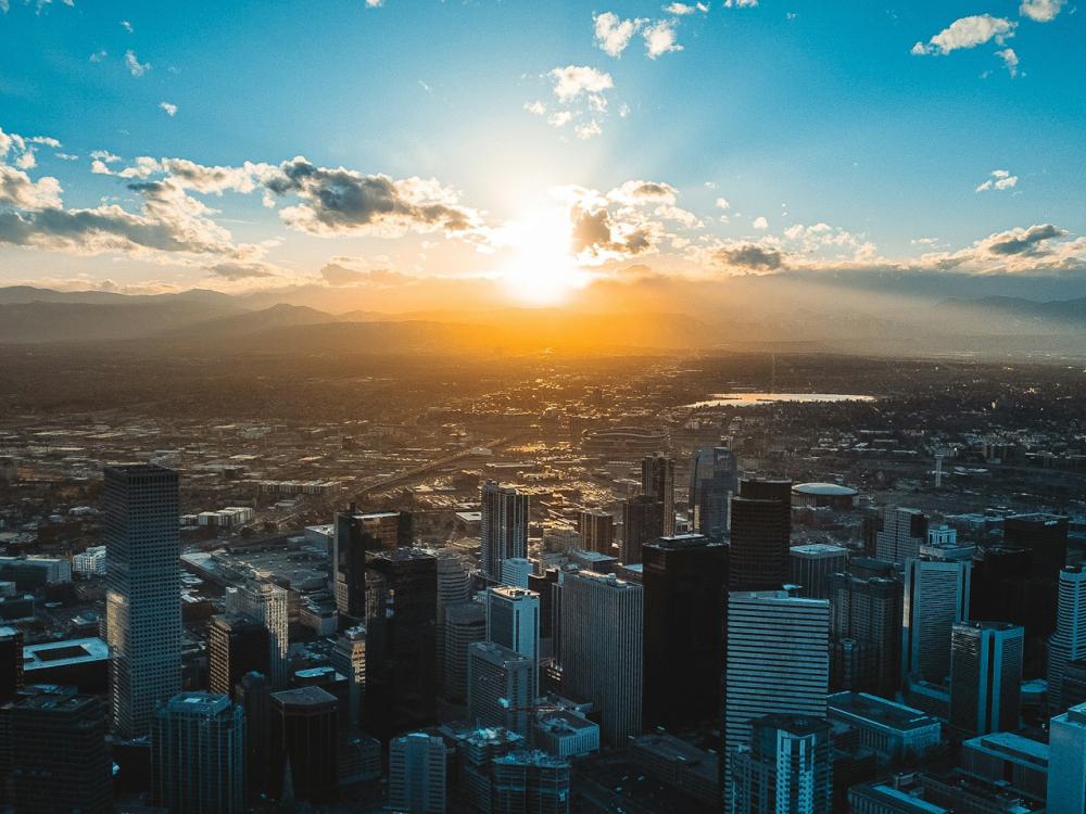 Denver skyline with sun setting.